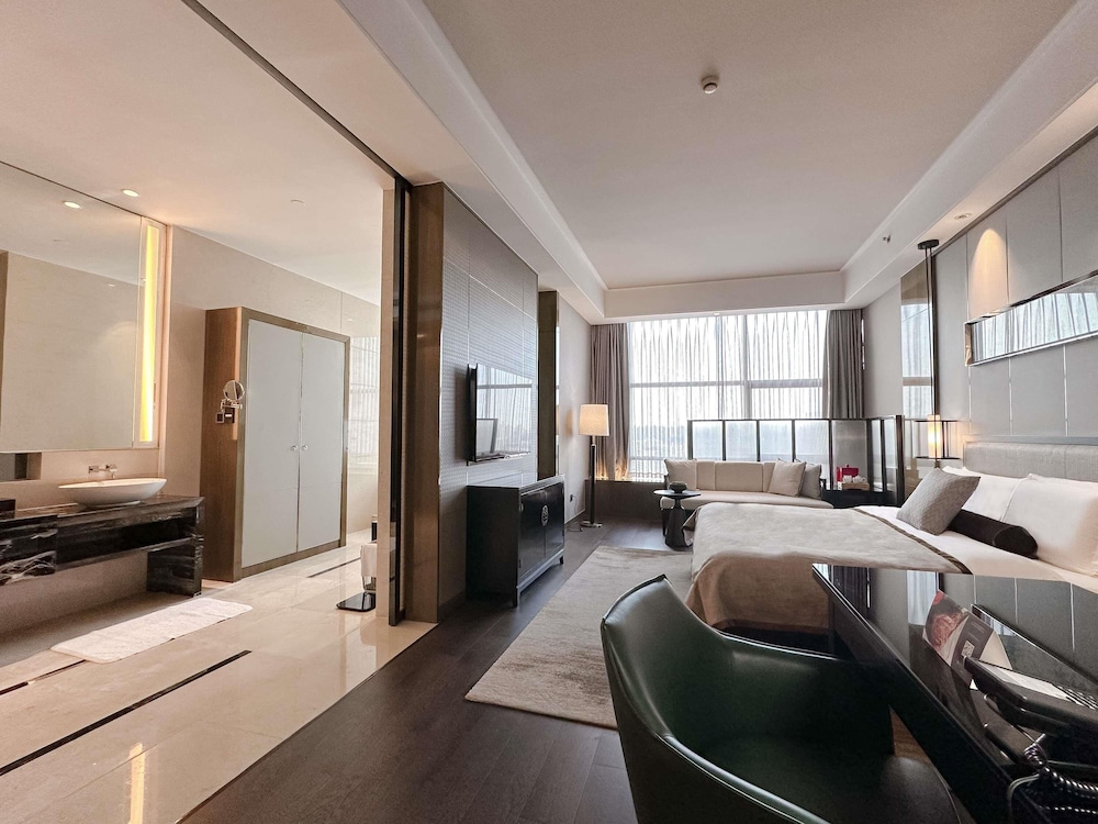 Suite CEO, 1 Cama King Size del hotel Pullman Shanghai Jing An. Foto 5