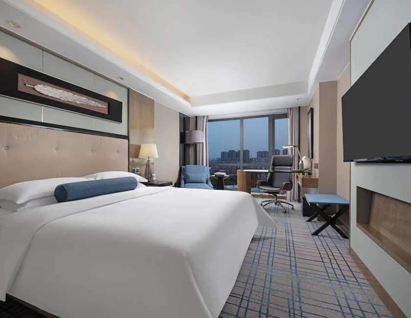 Habitación doble 1 Cama king Vista ciudad Esquinera del hotel Pullman Shanghai Jing An. Foto 1
