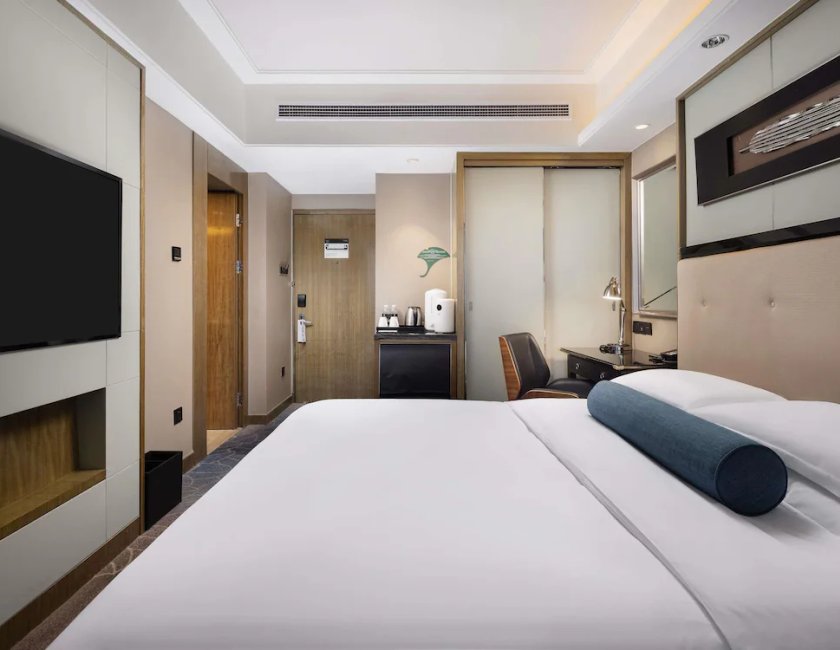 Habitación doble 1 Cama king Vista ciudad Esquinera del hotel Pullman Shanghai Jing An. Foto 3