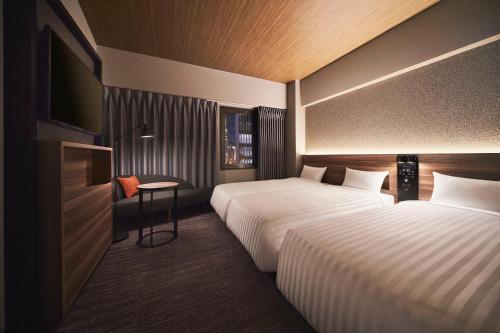 Habitación Triple - No fumadores del hotel Rihga Place Higobashi. Foto 6