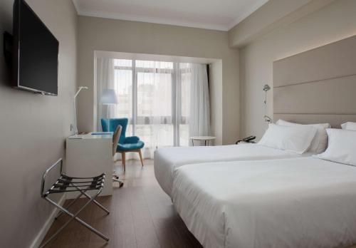 Habitación doble Vista ciudad 1 Cama doble del hotel Nh Las Palmas Playa Las Canteras. Foto 1