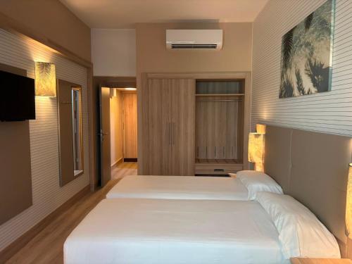 Habitación Triple del hotel Bull Astoria. Foto 2