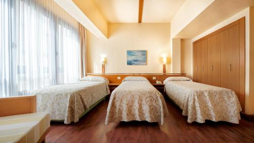 Habitación Triple del hotel Bull Astoria