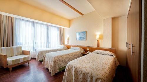 Habitación Triple del hotel Bull Astoria. Foto 1