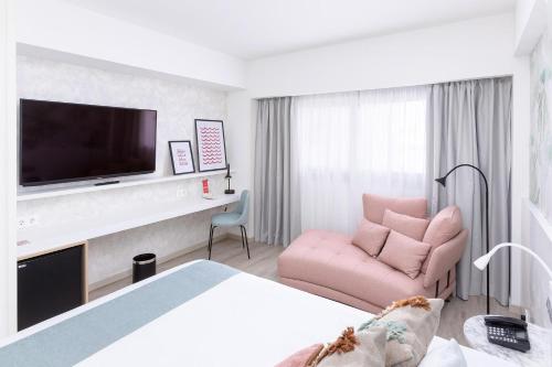 Habitación Doble Confort del hotel Cristina by Tigotan. Foto 2