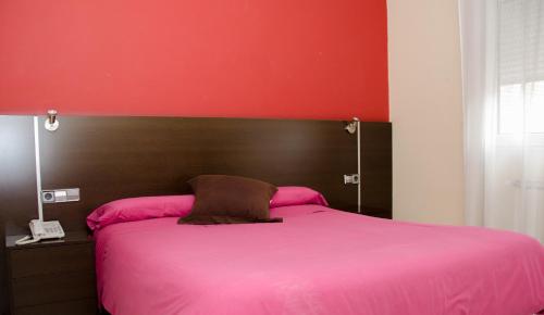 Habitación Triple del hotel Ciudad De Alcala. Foto 1