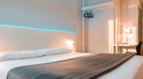 Habitación Doble - 1 o 2 camas del hotel Vertice Roomspace Madrid. Foto 1
