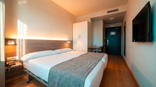Habitación Doble - 1 o 2 camas del hotel Vertice Roomspace Madrid. Foto 2