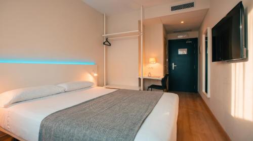 Habitación Doble - 1 o 2 camas del hotel Vertice Roomspace Madrid. Foto 3