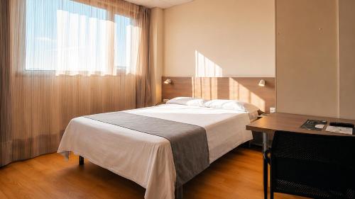 Habitación Doble - 1 o 2 camas del hotel Vertice Roomspace Madrid. Foto 7