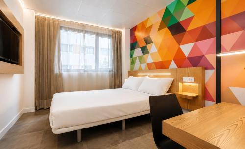 Habitación Doble - 1 o 2 camas del hotel Vertice Roomspace Madrid. Foto 8