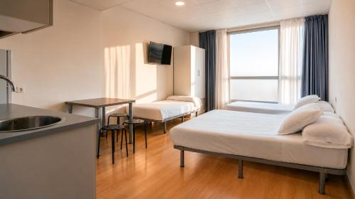 Habitación Familiar del hotel Vertice Roomspace Madrid. Foto 8
