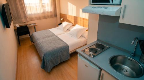 Habitación Doble con zona de cocina - 1 o 2 camas del hotel Vertice Roomspace Madrid