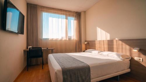 Habitación Doble con zona de cocina - 1 o 2 camas del hotel Vertice Roomspace Madrid. Foto 4