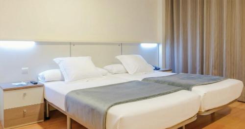 Habitación Doble - 1 o 2 camas del hotel Vertice Roomspace Madrid. Foto 2