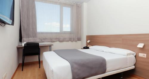 Habitación Doble - 1 o 2 camas del hotel Vertice Roomspace Madrid. Foto 3