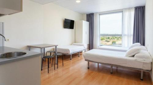 Habitación Familiar del hotel Vertice Roomspace Madrid. Foto 3