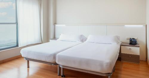 Habitación Familiar del hotel Vertice Roomspace Madrid. Foto 10