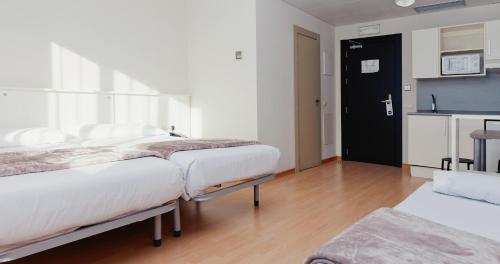 Habitación Familiar del hotel Vertice Roomspace Madrid. Foto 17