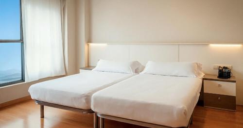 Habitación Familiar del hotel Vertice Roomspace Madrid. Foto 25