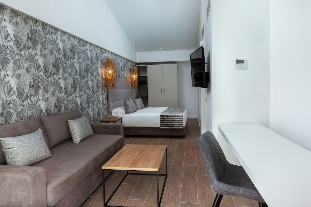 Junior suite Vista Jardín Sofá Cama incluido 2 Camas individuales del hotel Kumara Serenoa By Lopesan Hotels. Foto 3