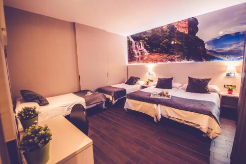 Habitación Doble con 2 camas supletorias del hotel Prado