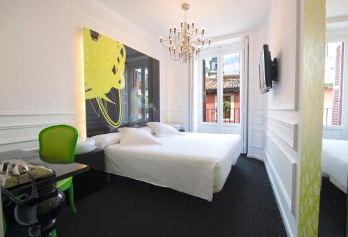 Habitación doble con balcón del hotel Posada Del Dragón Boutique. Foto 4