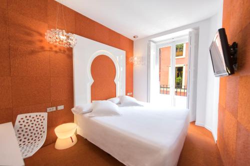 Habitación doble con balcón del hotel Posada Del Dragón Boutique. Foto 8