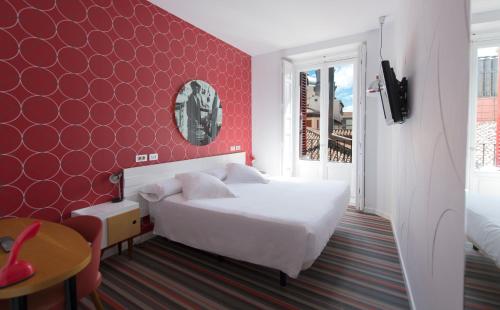 Habitación doble con balcón del hotel Posada Del Dragón Boutique. Foto 9