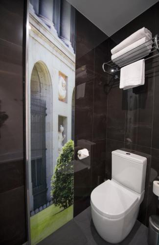 Habitación doble con balcón del hotel Posada Del Dragón Boutique. Foto 17