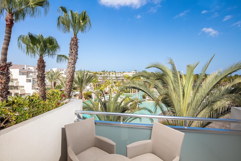 Suite Balcón o Terraza 1 Cama queen Vista Patio del hotel Maspalomas Princess. Foto 15