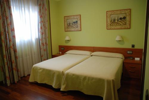 Habitación Doble con Cama supletoria del hotel Los 5 Pinos