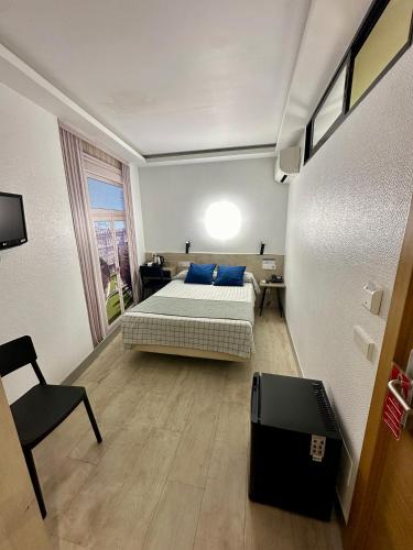 Habitación Doble Económica del hotel Castilla Ii - Puerta Del Sol. Foto 2