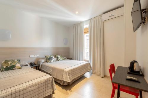 Habitación Triple del hotel Castilla Ii - Puerta Del Sol. Foto 14