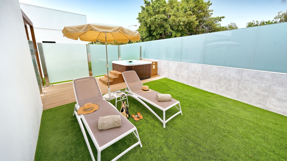 Habitación Deluxe Jardín Privado y Jacuzzi del hotel Club Maspalomas Suites and Spa - Adults Only. Foto 6