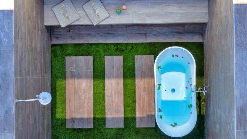 Habitación Doble Deluxe con bañera exterior del hotel Club Maspalomas Suites and Spa - Adults Only. Foto 1