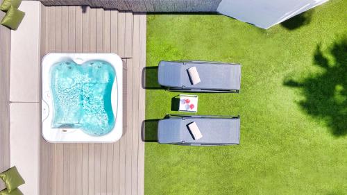 Suite con bañera de hidromasaje del hotel Club Maspalomas Suites and Spa - Adults Only. Foto 15