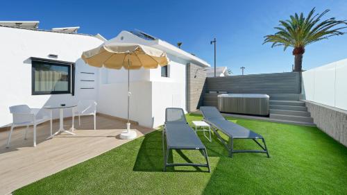 Junior suite Lujo Vista Jardin Jacuzzi 1 Cama super king del hotel Club Maspalomas Suites and Spa - Adults Only. Foto 13