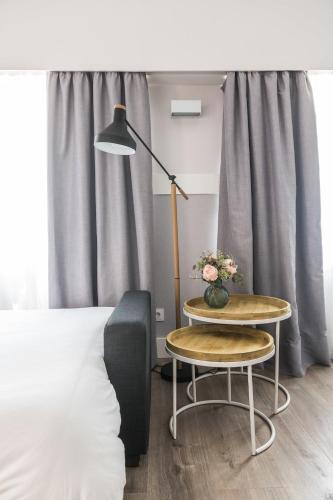 Habitación Triple del hotel Velázquez 45 by Pillow. Foto 5