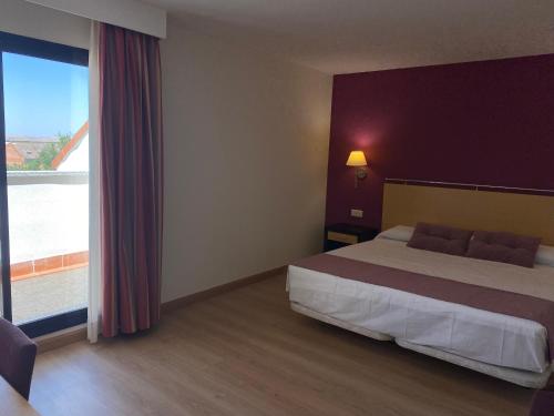 Habitación Doble con Terraza del hotel Equo Aranjuez. Foto 7