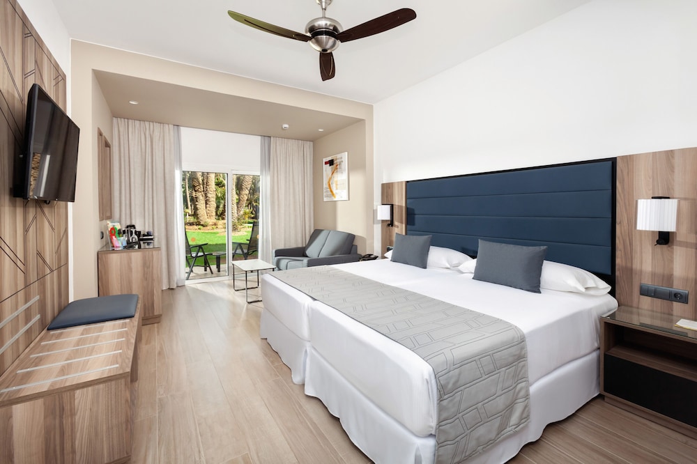 Habitación Doble con vistas al jardín del hotel Riu Palace Oasis. Foto 6