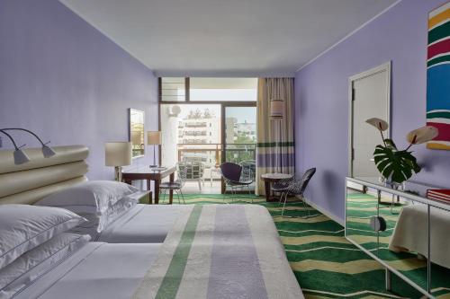 Habitación doble Lujo Vista Jardin Vista Mar o Piscina 2 Camas individuales del hotel Seaside Palm Beach. Foto 1