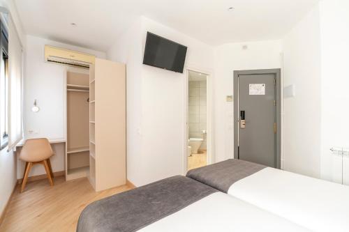 Habitación Doble Confort del hotel Sans. Foto 6