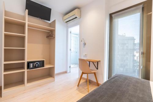 Habitación doble con balcón del hotel Sans. Foto 3