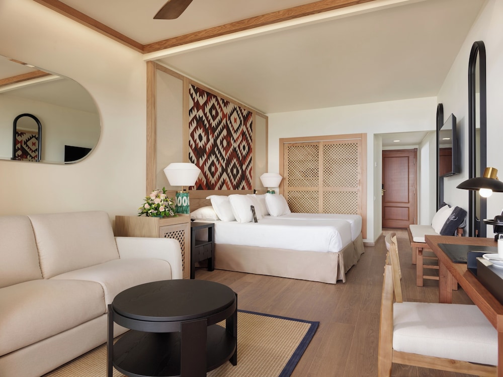 Habitación doble Balcón o Terraza Exclusive Sofá Cama incluido 2 Camas individuales del hotel H10 Playa Meloneras Horizons Collection. Foto 2