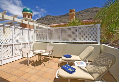 Habitación doble Bañera Balcón o Terraza Superior 2 Camas individuales del hotel Cordial Mogán Playa. Foto 1