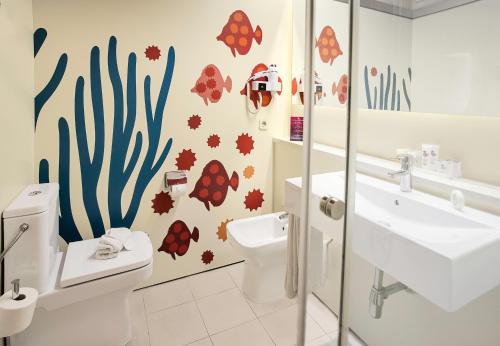 Habitación Doble Estándar con balcón francés del hotel LIVVO Puerto de Mogán. Foto 7