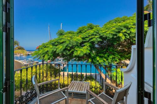 Habitación Doble con balcón o terraza y vistas al puerto del hotel LIVVO Puerto de Mogán. Foto 5