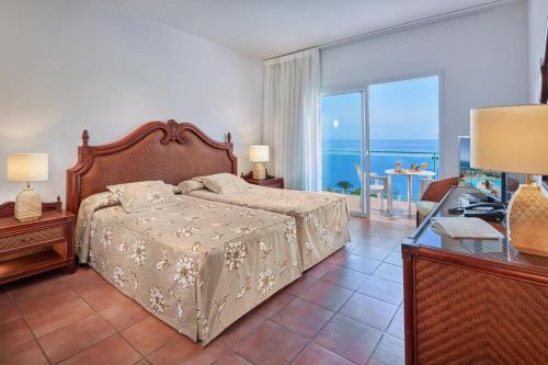 Habitación Doble con vistas al océano del hotel Mogan Princess and Beach Club. Foto 1