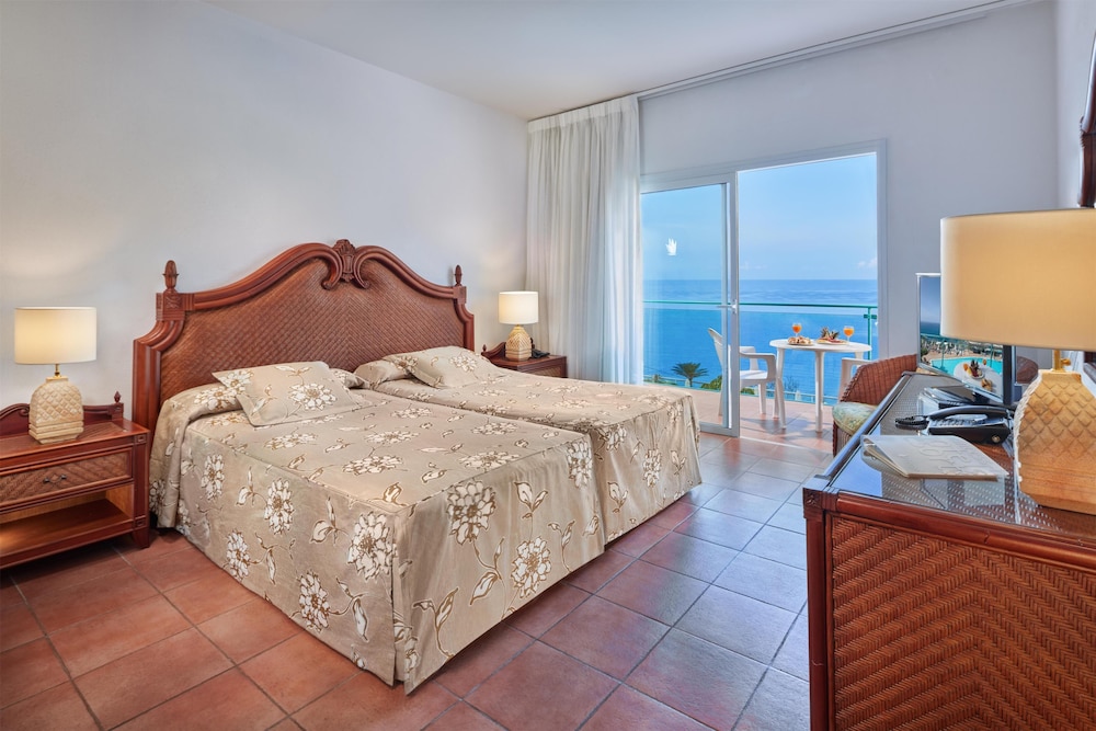Habitación doble Vista Mar Balcón o Terraza 2 Camas individuales Normal del hotel Mogan Princess and Beach Club. Foto 1